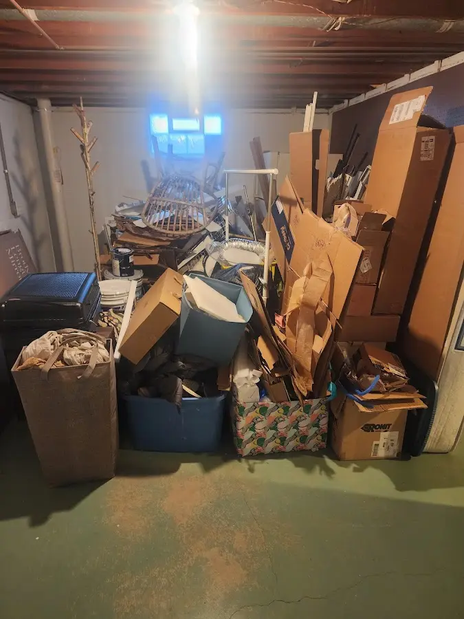 Roll-off dumpster container at job site for 2 Yard Dumpster Rental in Florida Gulf Coast University